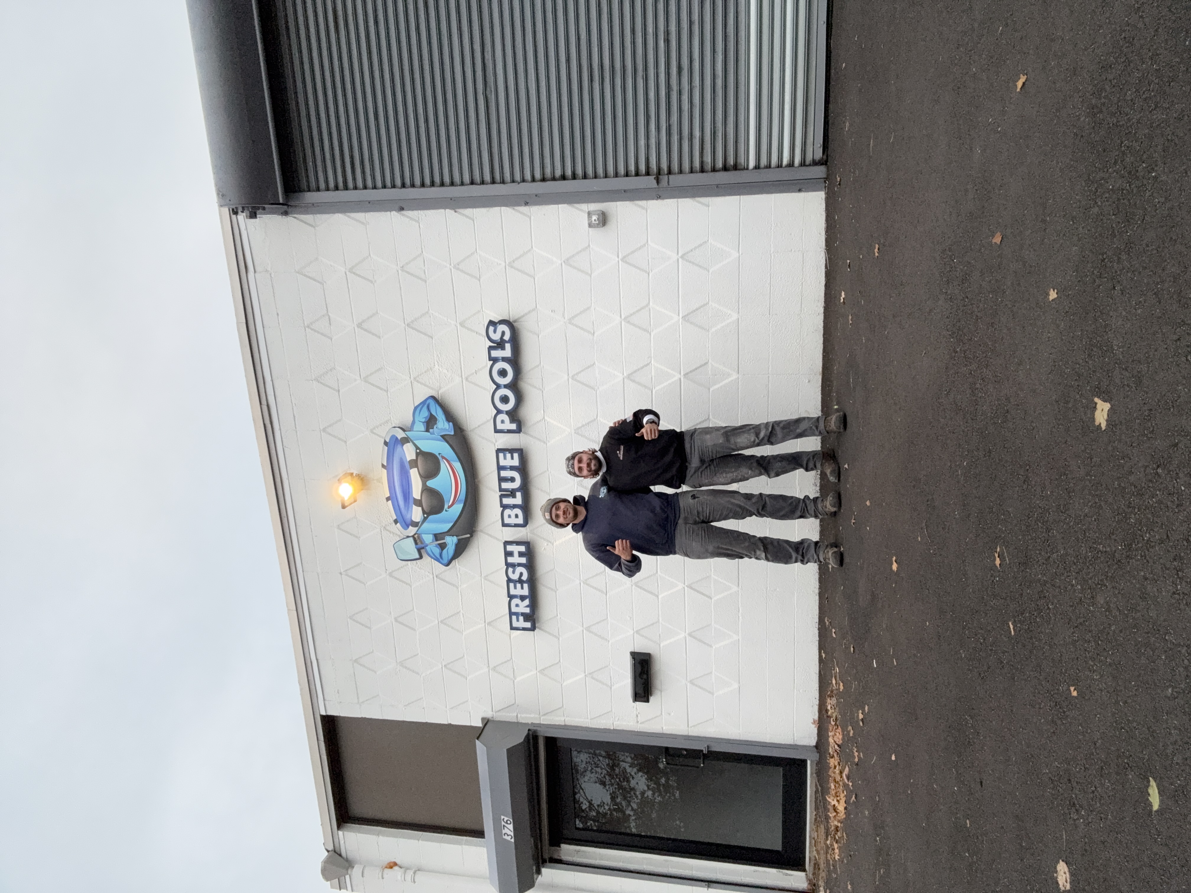 Noah and Sebastian in front of the new Fresh Blue Pools office in West Babylon, NY
